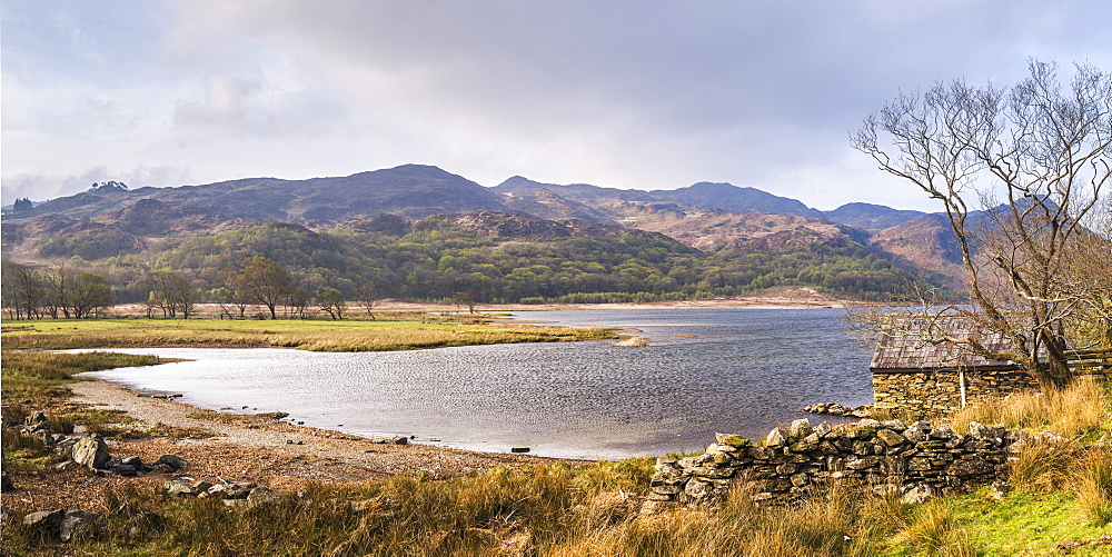 Llyn Dinas Lake in first sunlight, Snowdonia National Park, North Wales, United Kingdom, Europe