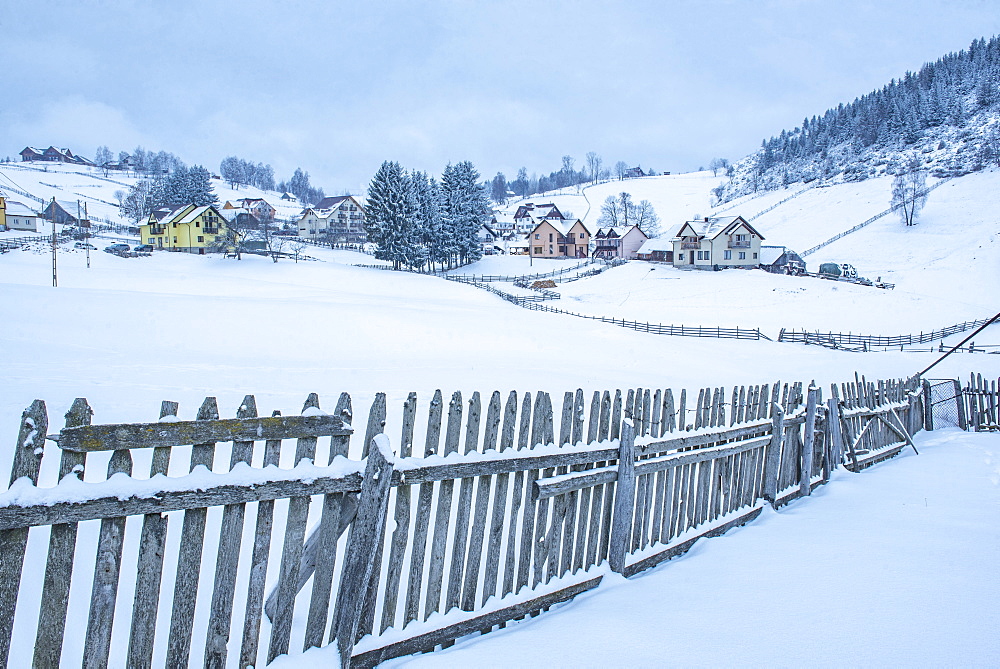 Village near Bran in the Carpathian Mountains in Winter, Transylvania, Romania, Europe