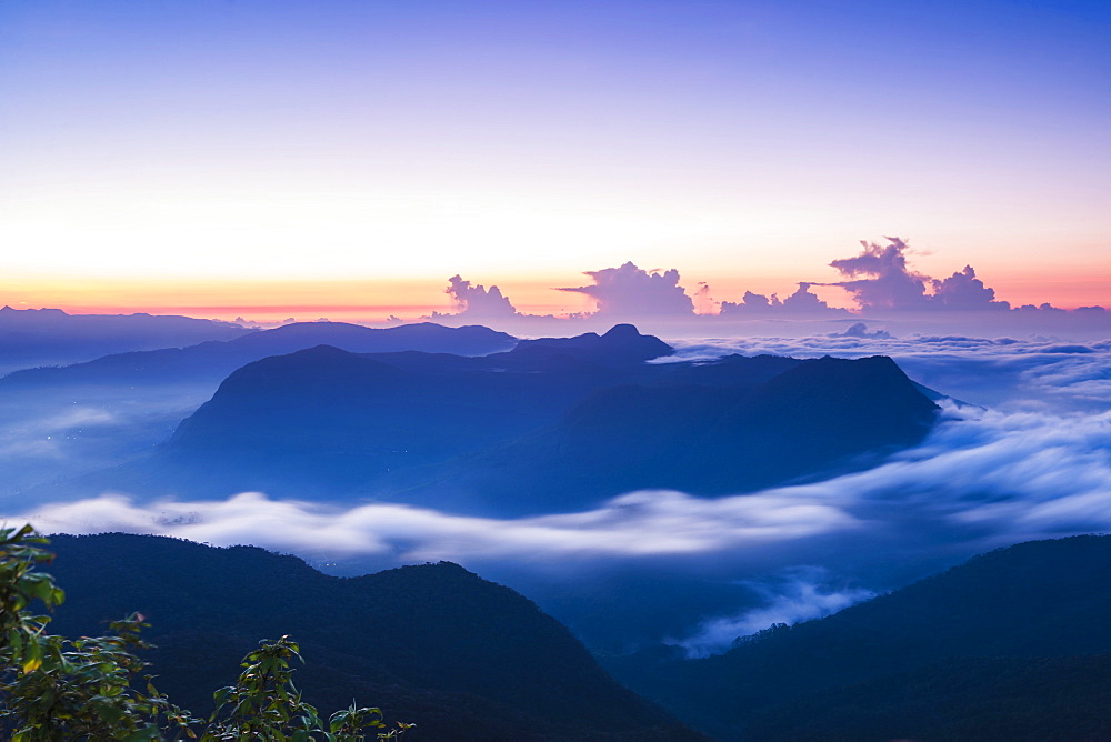 View of mountains from the 2443m summit of Adams Peak (Sri Pada) at sunrise, Central Highlands, Sri Lanka, Asia