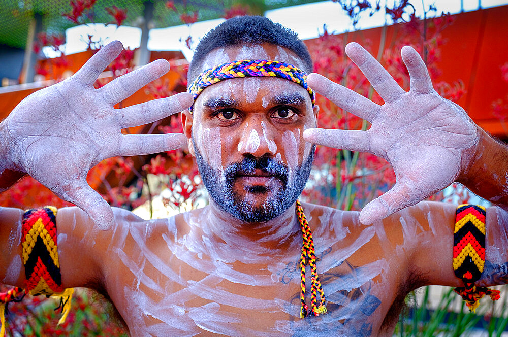 Portrait, Noongar Aboriginal dancers perform songs showcasing their culture in Yagan Square, Perth City, Western Australia, Australia, Pacific