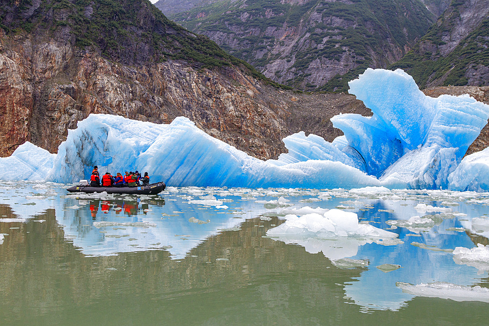 Guests from the Lindblad Expeditions ship National Geographic Sea Bird during Zodiac operations in Tracy Arm, Southeast Alaska, United States of America, North America