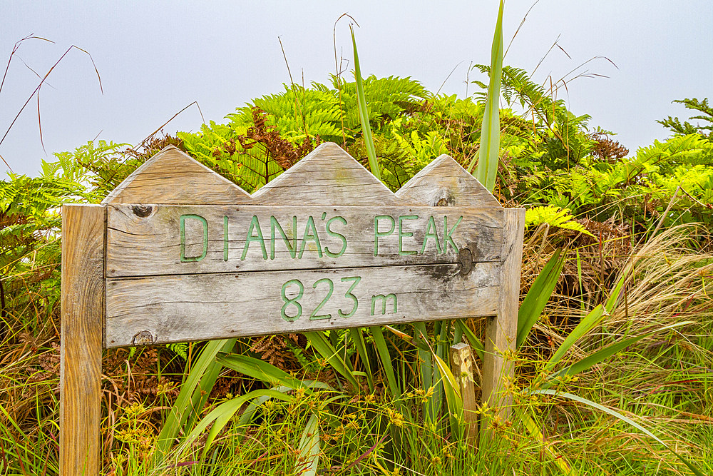 Sign on the peak on the trail of Diana's Peak National Park on Saint Helena, South Atlantic Ocean