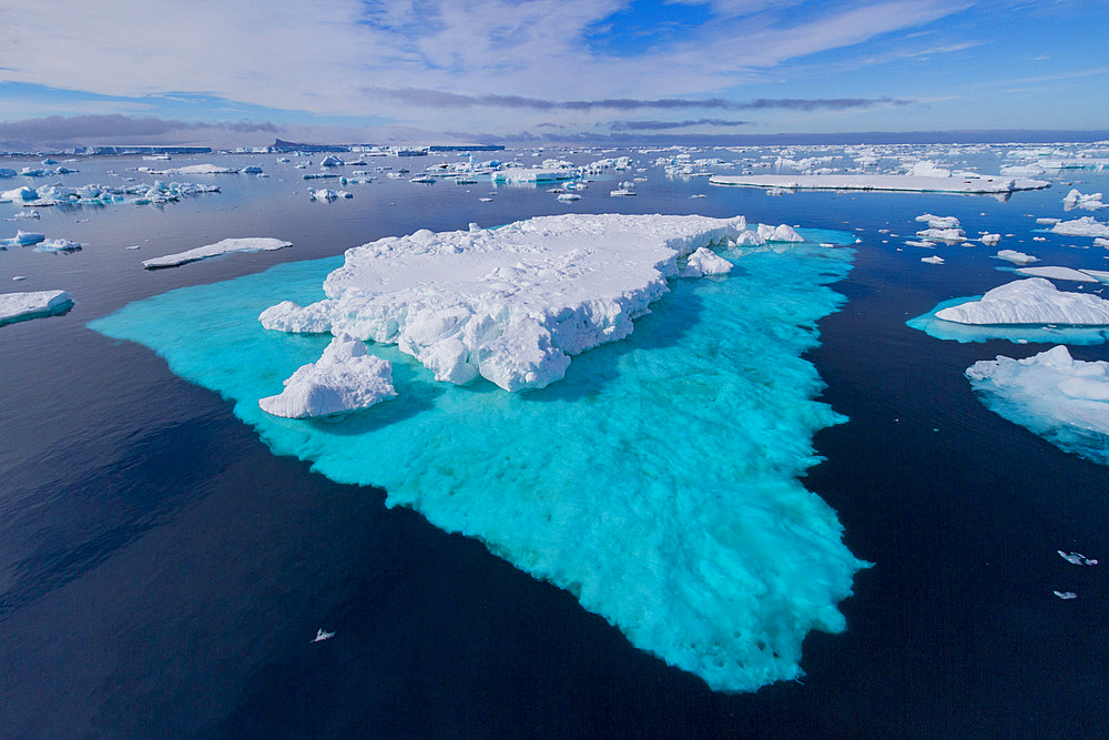 Icebergs and sea ice in the Weddell Sea on the eastern side of the Antarctic Peninsula during the summer months, Southern Ocean.