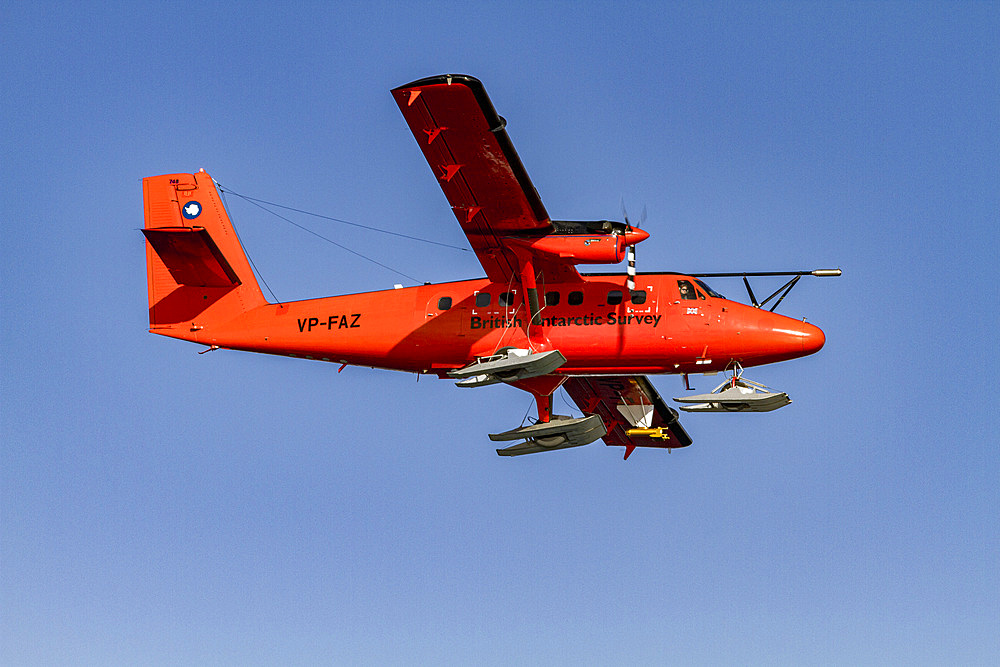 British Antarctic Survey (BAS) research plane operating in the Gullet, near Rothera Station near the Antarctic Peninsula, Polar Regions