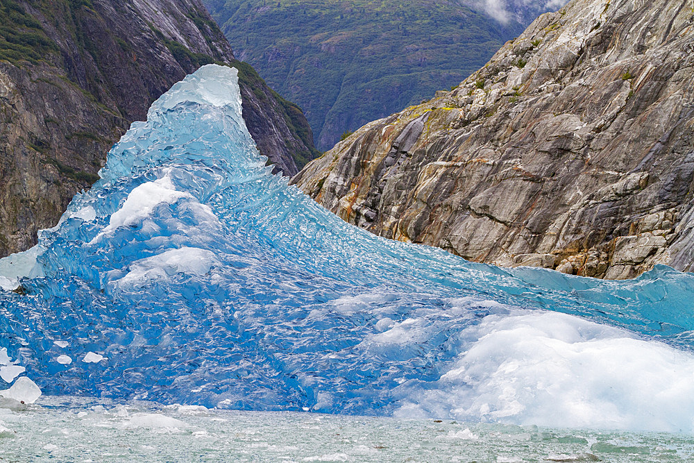 Glacial iceberg detail from ice calved off the Sawyer Glacier in Tracy Arm, Southeast Alaska, USA, Pacific Ocean.