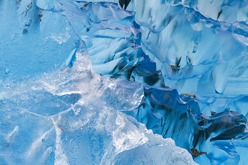 Glacial iceberg detail from ice calved off the Sawyer Glacier in Tracy Arm, Southeast Alaska, USA, Pacific Ocean.