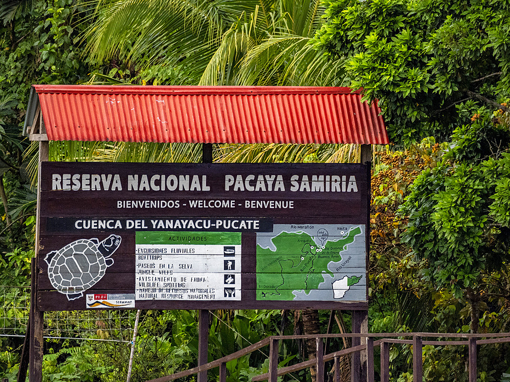 Local preserve signage in a national park deep within the Pacaya Samiria Preserve, Peru.
