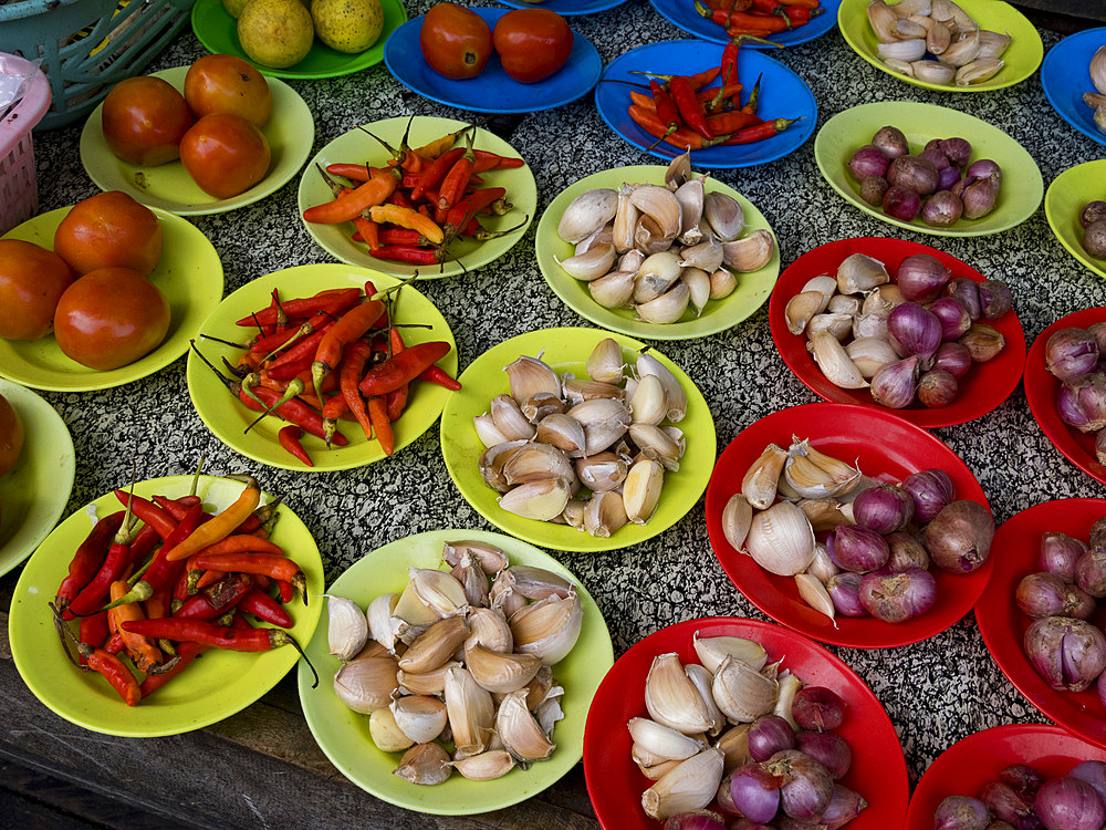 Offerings for sale in the crowded streets in the town of Agats, Asmat Regency, South Papua, Indonesia.