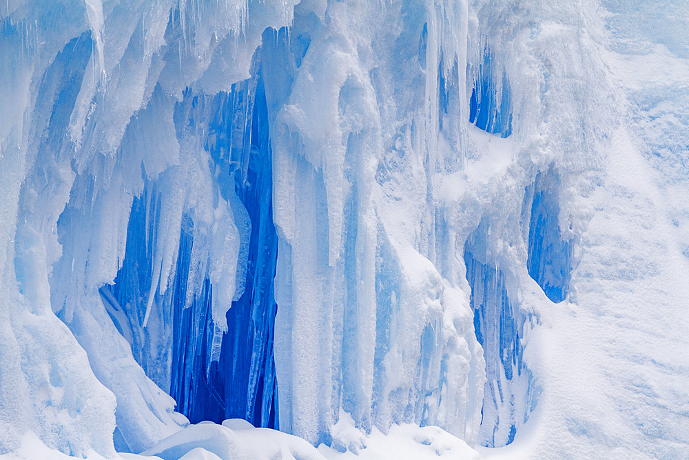 Iceberg detail showing the color blue around the Antarctic Peninsula, during the Austral summer months, Antarctica.