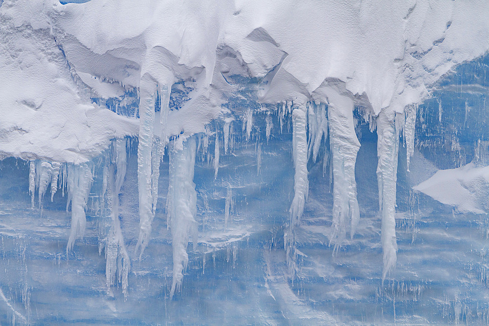 Iceberg detail showing the color blue around the Antarctic Peninsula, during the Austral summer months, Antarctica.