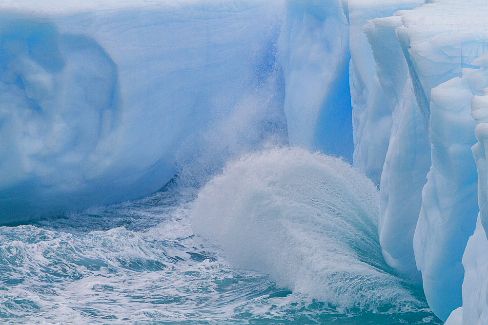 Iceberg detail showing the color blue around the Antarctic Peninsula, during the Austral summer months, Antarctica.