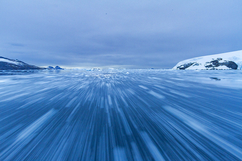 Iceberg detail showing the color blue around the Antarctic Peninsula, during the Austral summer months, Antarctica.