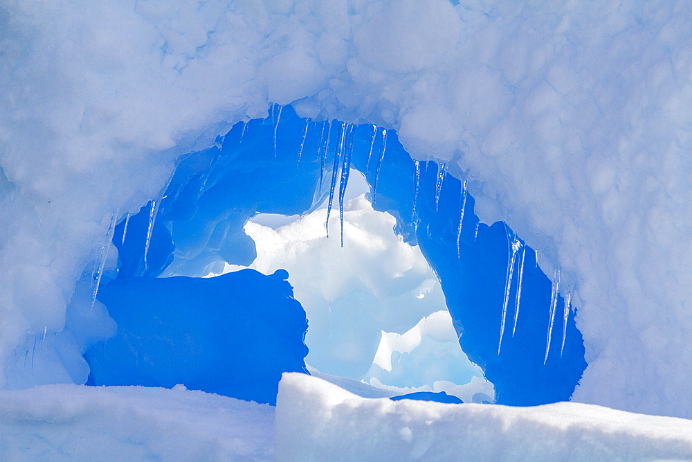 Iceberg detail showing the color blue around the Antarctic Peninsula, during the Austral summer months, Antarctica.