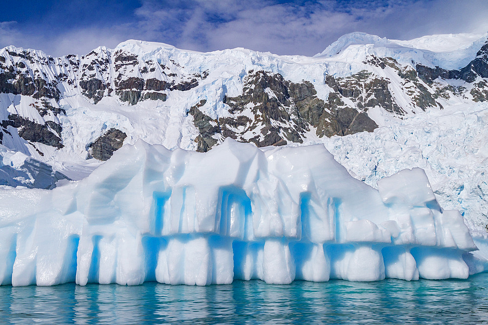 Iceberg detail showing the color blue around the Antarctic Peninsula, during the Austral summer months, Antarctica.