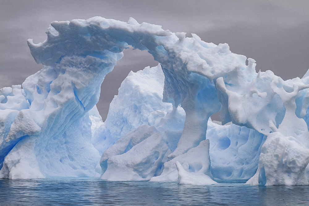 Iceberg detail showing the color blue around the Antarctic Peninsula, during the Austral summer months, Antarctica.