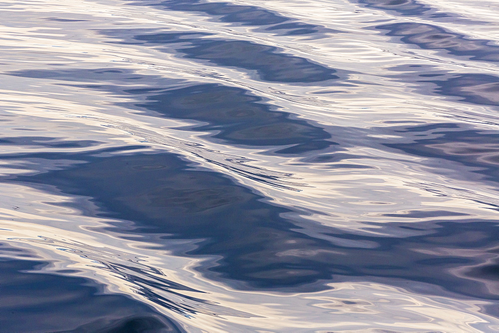 Reflections from ships wake in the sea near the town of Ilulissat, Greenland, Polar Regions