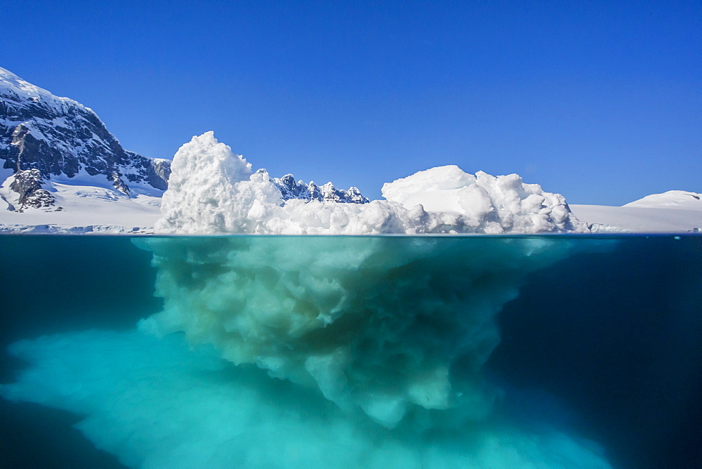 Above and below view of glacial ice near Wiencke Island, Neumayer Channel, Antarctica, Polar Regions