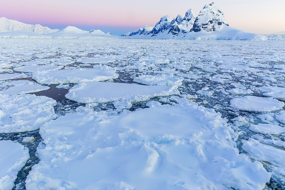 Transiting the Lemaire Channel in heavy first year sea ice, Antarctica, Polar Regions