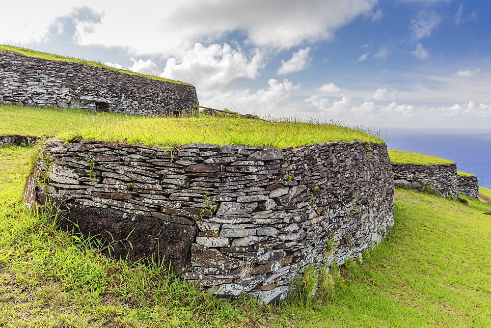 One of 53 stone masonry houses at Orongo, a stone village and Birdman ceremonial site at the southwestern tip of Easter Island, Rapa Nui National Park, UNESCO World Heritage Site, Easter Island (Isla de Pascua), Chile, South America