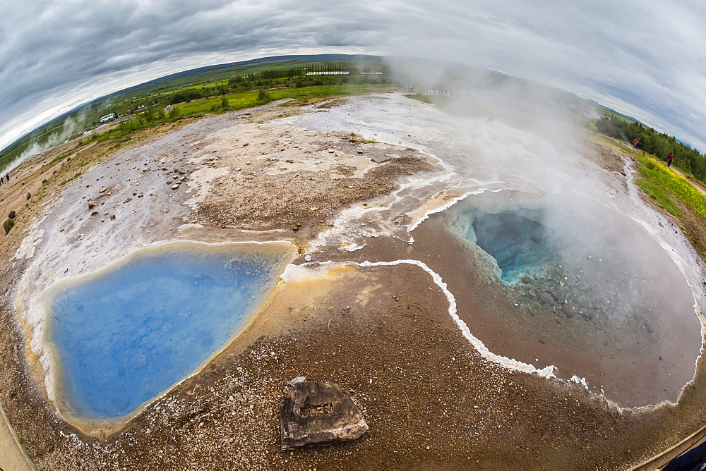 View of hot springs in the Haukadalur valley on the slopes of Laugarfjall hill, Iceland, Polar Regions