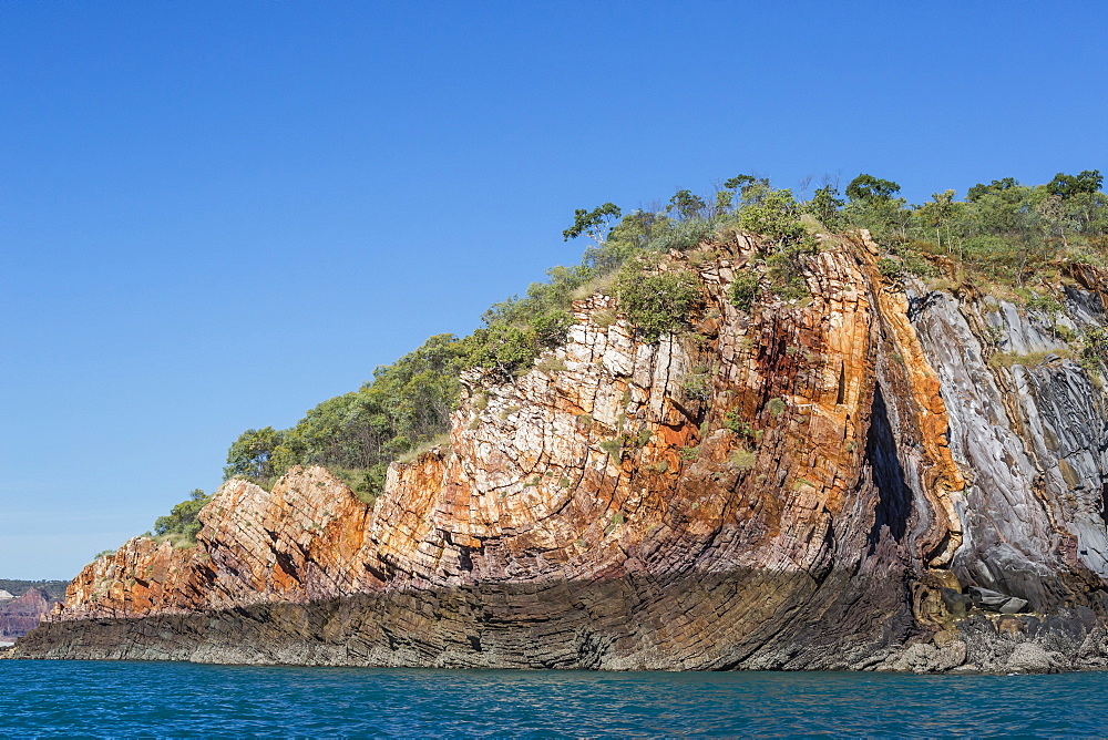 The 1.7 billion year old Elgee sandstone cliffs in Yampi Sound, Kimberley, Western Australia, Australia, Pacific