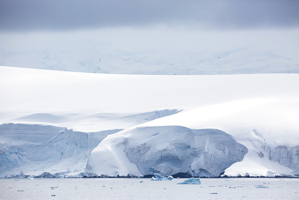 Snow covered mountains and glaciers in Dallmann Bay, Antarctica, Polar Regions