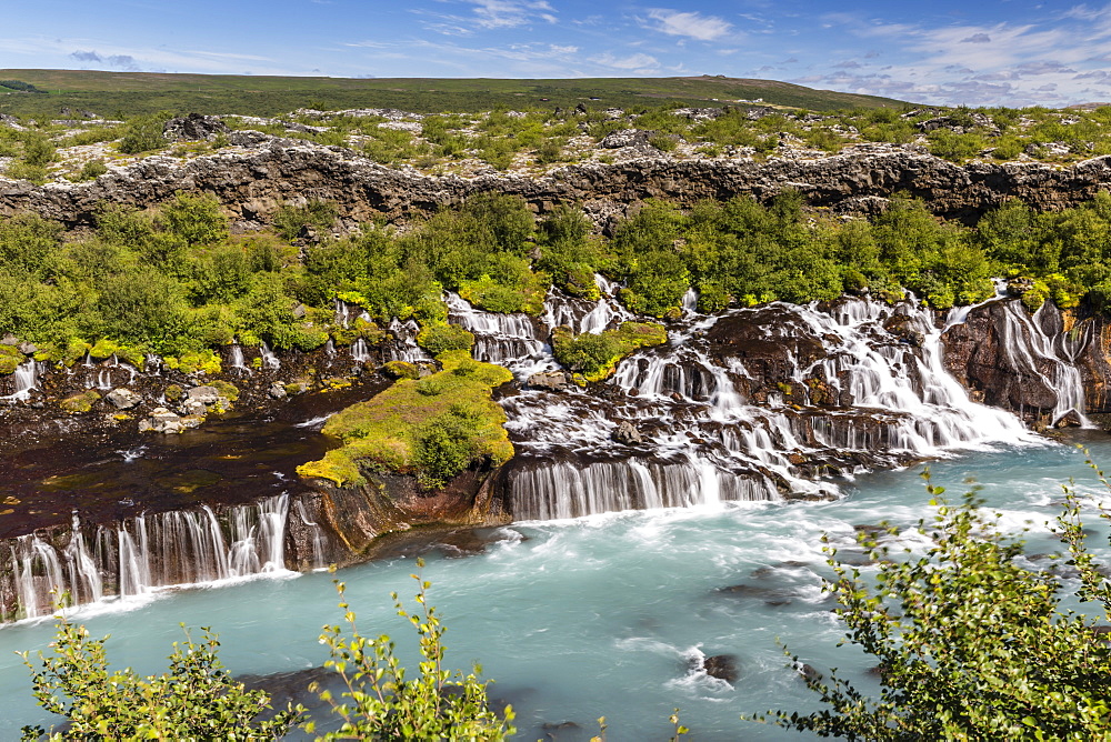 Hraunfossar, a series of waterfalls pouring into the Hvita River, Borgarfjordur, western Iceland, Polar Regions