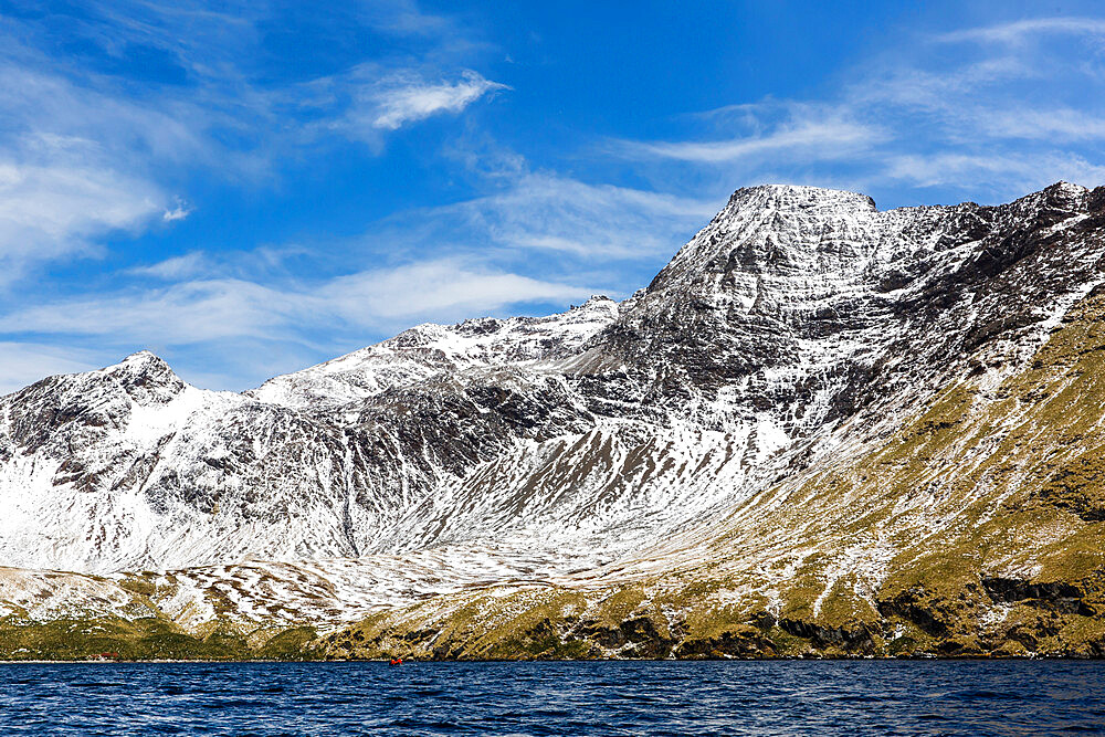 Fresh dusting of snow on the mountains surrounding Godthul, South Georgia, UK Overseas Protectorate, Polar Regions