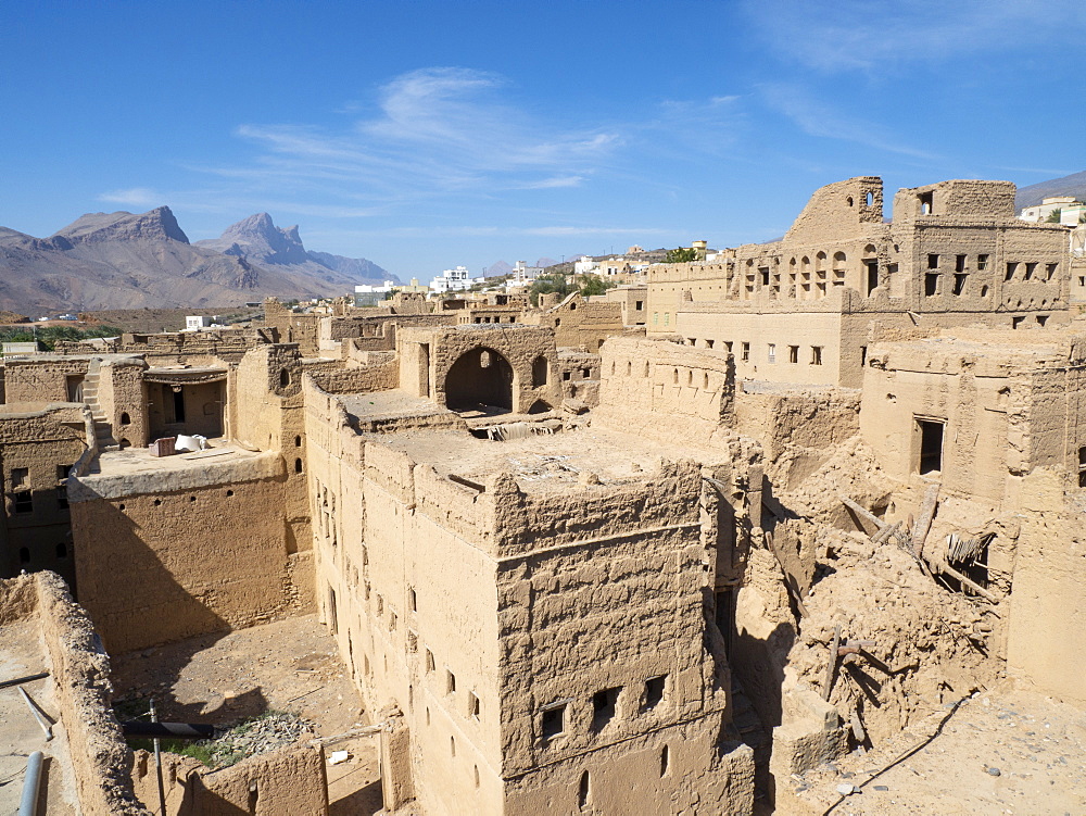 Exterior view of a mostly abandoned mud construction houses in Bait Al Safah, Al Hamra, Sultanate of Oman, Middle East