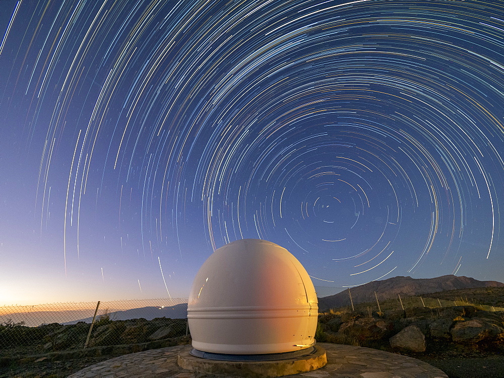 Star trails over an observatory on Jebel Shams, the highest mountain of the Hajar range, Sultanate of Oman, Middle East