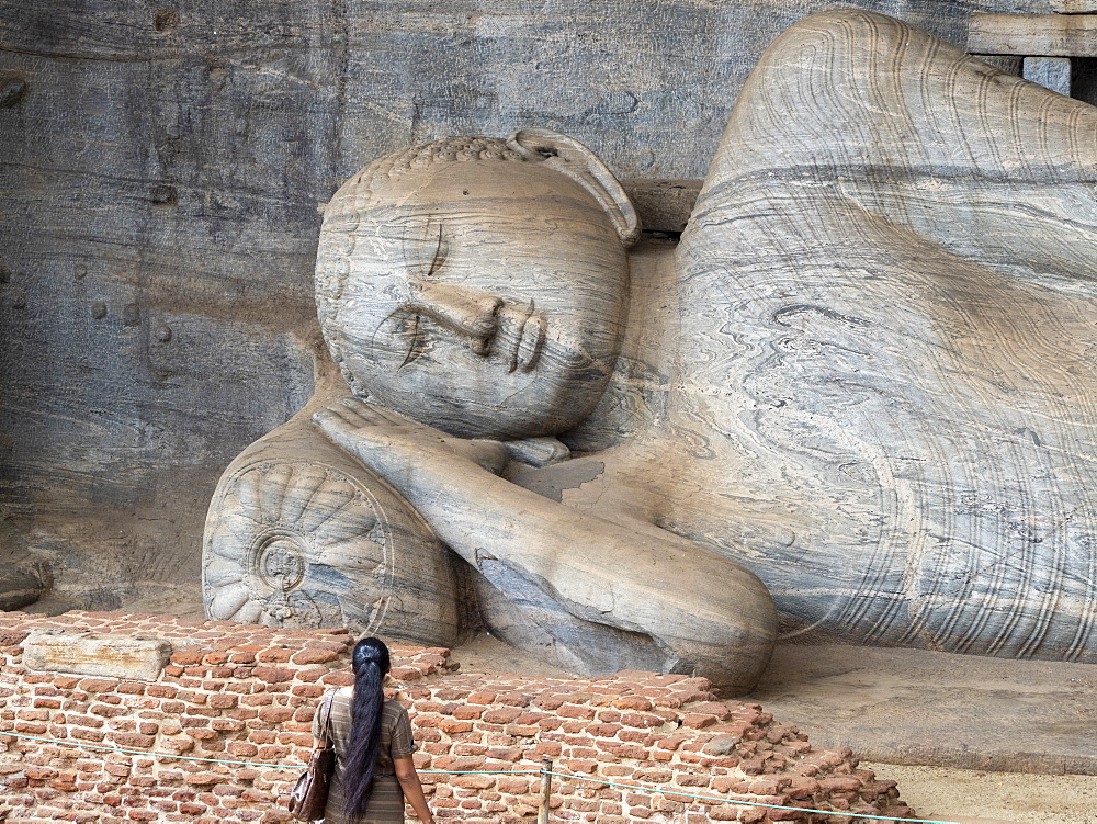 The reclining Buddha figure inside Gal Viharaya, UNESCO World Heritage Site, Polonnaruwa, Sri Lanka, Asia