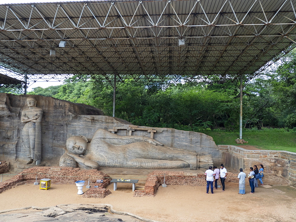 The reclining Buddha figure inside the Gal Viharaya, Polonnaruwa, UNESCO World Heritage Site, Sri Lanka, Asia