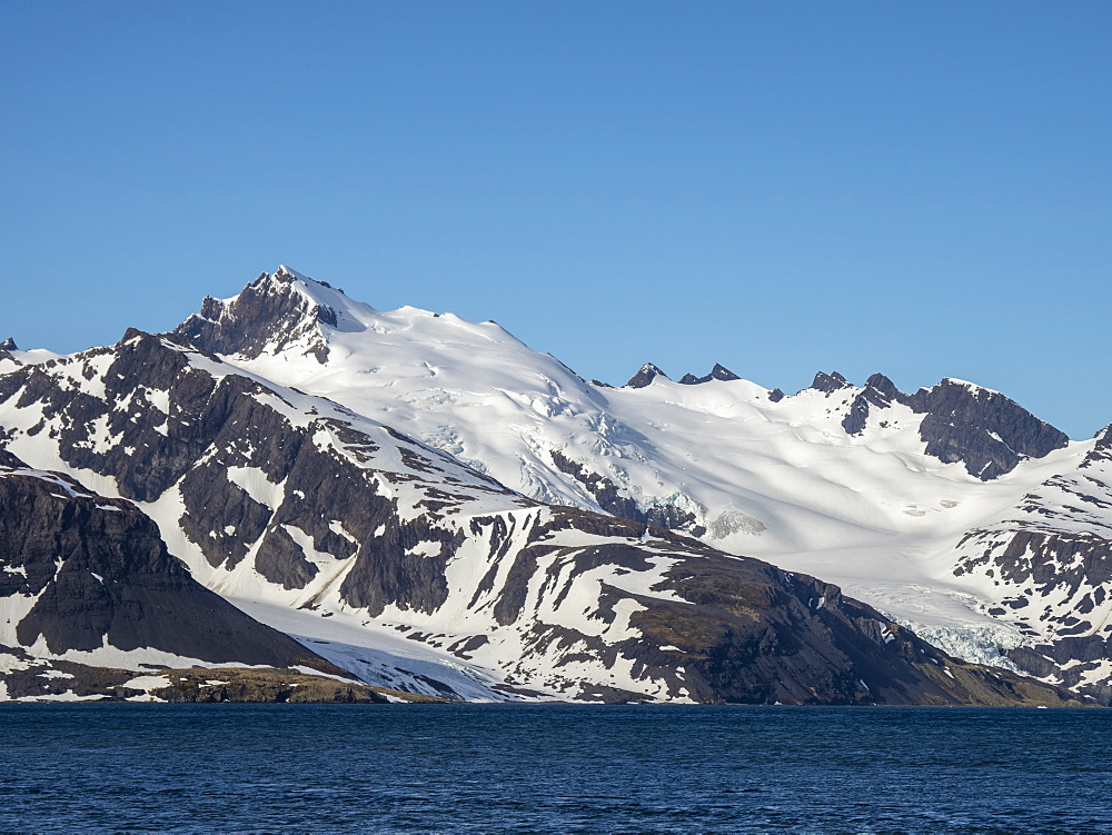 Snow-covered mountains in King Haakon Bay, South Georgia, Polar Regions