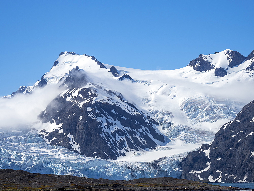 Snow-covered mountains and glaciers in King Haakon Bay, South Georgia, Polar Regions