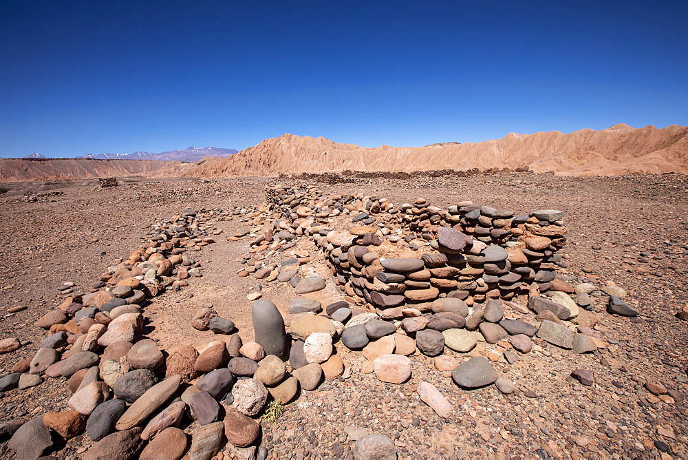 Remnants of rock structures in Tambo de Catarpe, Catarpe Valley in the Atacama Desert, Chile, South America