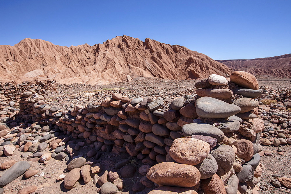 Remnants of rock structures in Tambo de Catarpe, Catarpe Valley in the Atacama Desert, Chile, South America