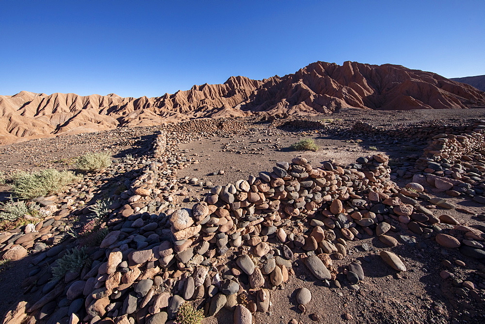 Remnants of rock structures in Tambo de Catarpe, Catarpe Valley in the Atacama Desert, Chile, South America