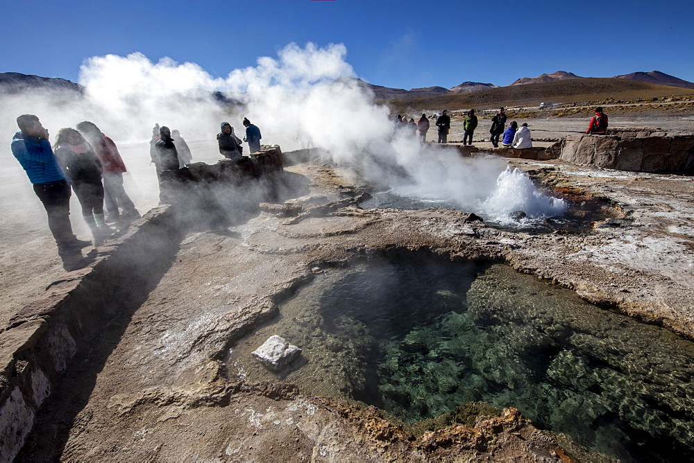 Tourists at the Geysers del Tatio (El Tatio), the third largest geyser field in the world, Andean Central Volcanic Zone, Antofagasta Region, Chile, South America