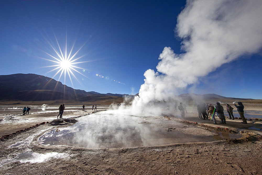 Tourists at the Geysers del Tatio (El Tatio), the third largest geyser field in the world, Andean Central Volcanic Zone, Antofagasta Region, Chile, South America