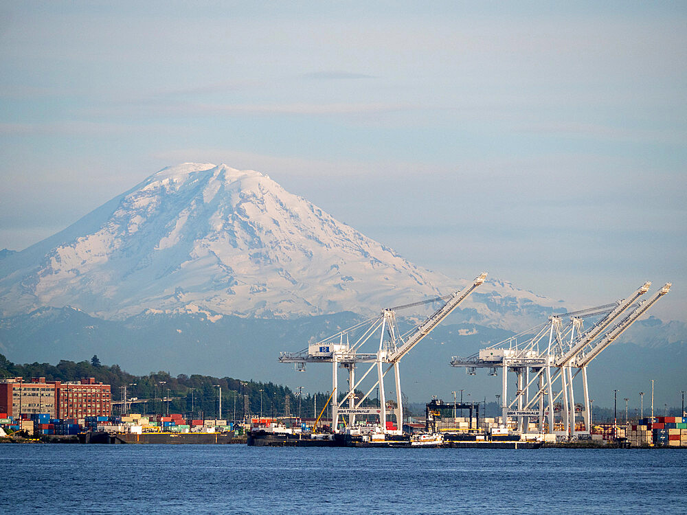 View of the commercial docks in Seattle with Mount Rainier in the background, Seattle, Washington State, United States of America, North America