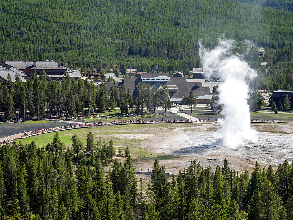 The cone geyser called Old Faithful erupting, Yellowstone National Park, UNESCO World Heritage Site, Wyoming, United States of America, North America