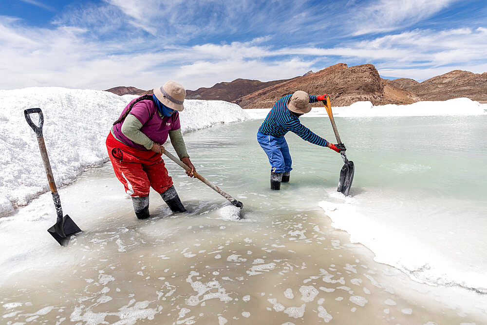 Salt workers near Coqueza, a small town near the Thunupa Volcano, Salar de Uyuni, Daniel Campos Province, Bolivia, South America