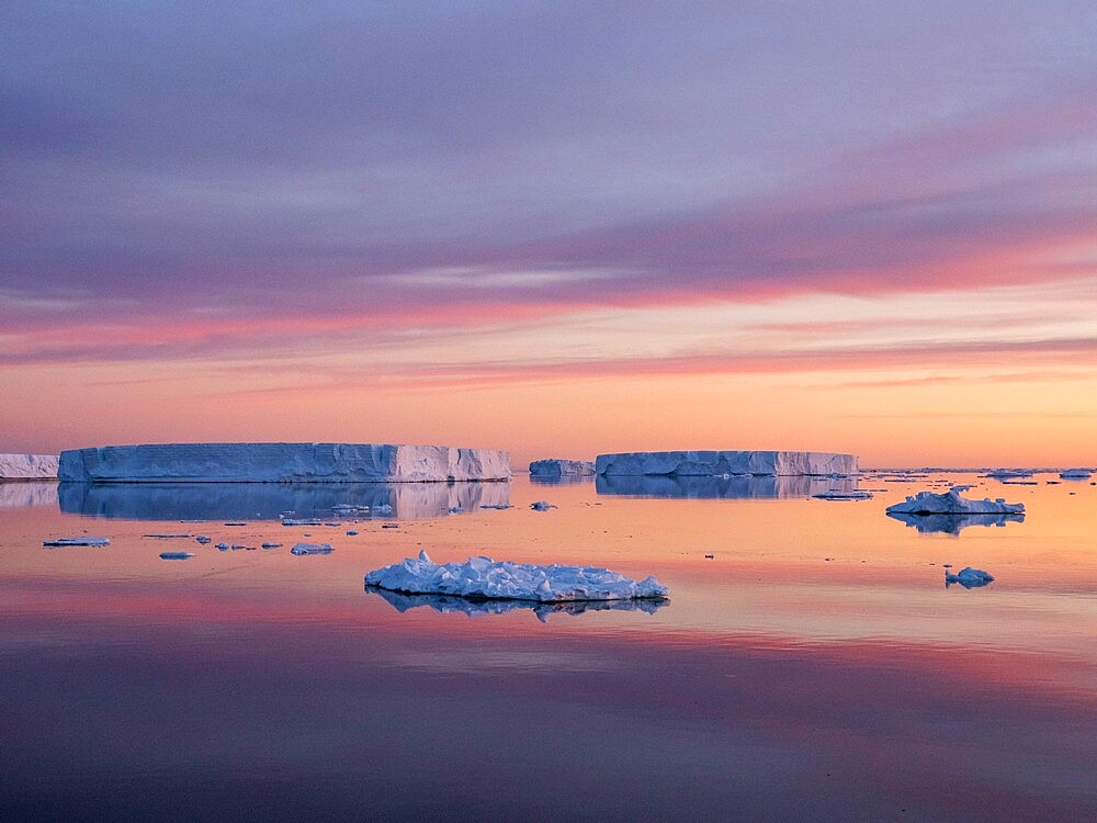 Sunset over tabular and glacial ice near Snow Hill Island, Weddell Sea, Antarctica, Polar Regions