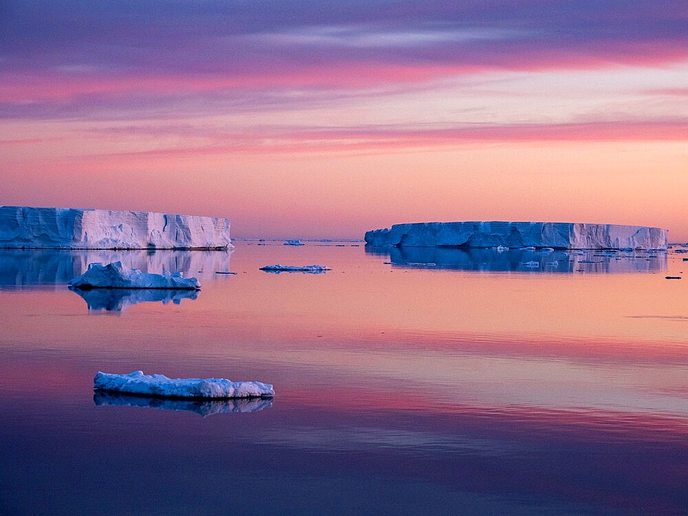 Sunset over tabular and glacial ice near Snow Hill Island, Weddell Sea, Antarctica, Polar Regions