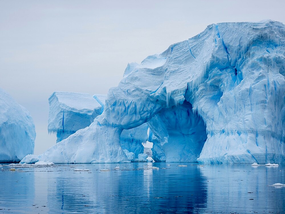 Large iceberg grounded on a reef at Peter I Island, Bellingshausen Sea, Antarctica, Polar Regions