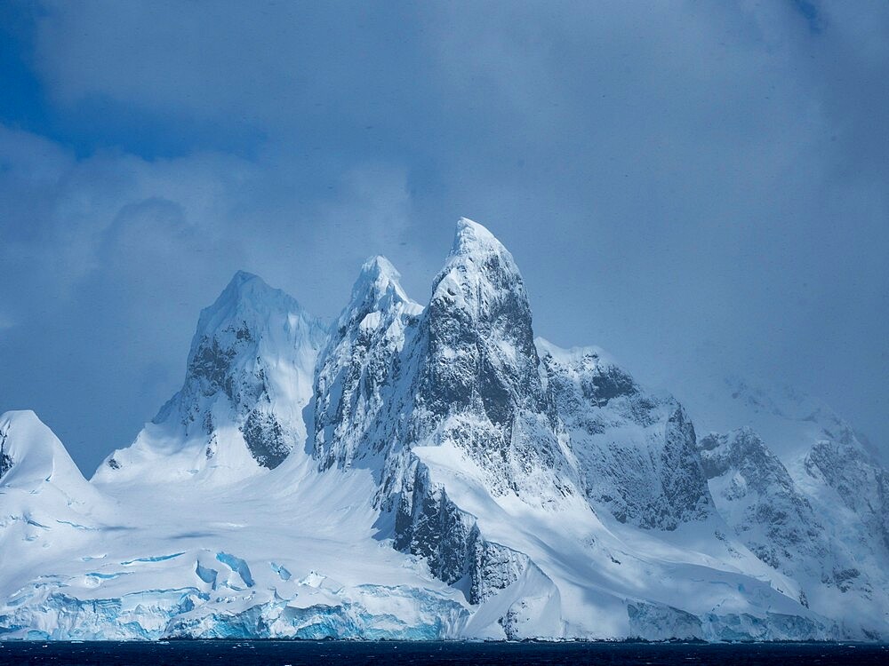 Una Peaks on false Cape Renard, the northern entrance to the Lemaire Channel, Antarctica, Polar Regions