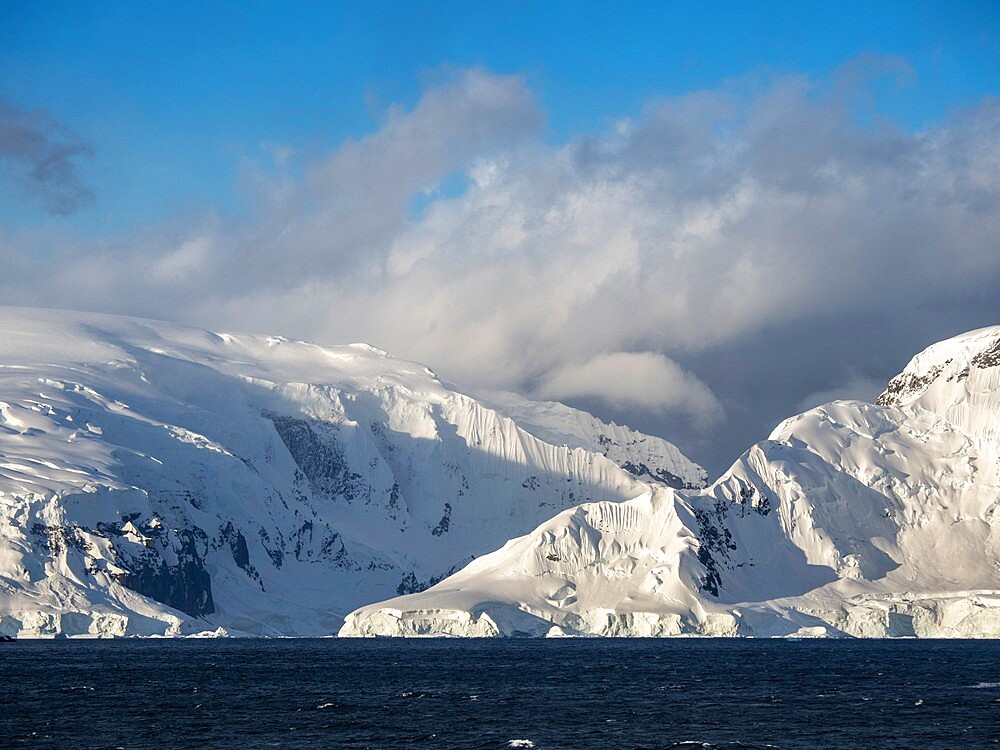 Snow-covered mountains on Danco Island, in front of the Antarctic Peninsula, Antarctica, Polar Regions