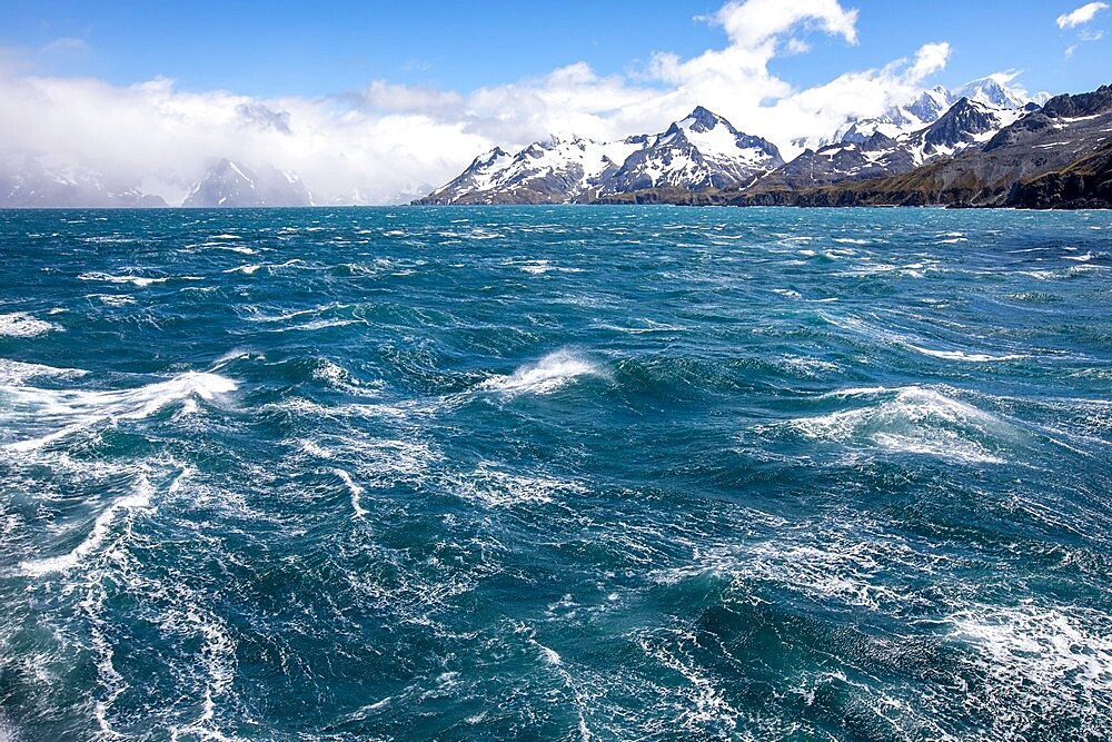 A view of snow-capped mountains and glaciers in Cooper Bay, South Georgia, South Atlantic, Polar Regions