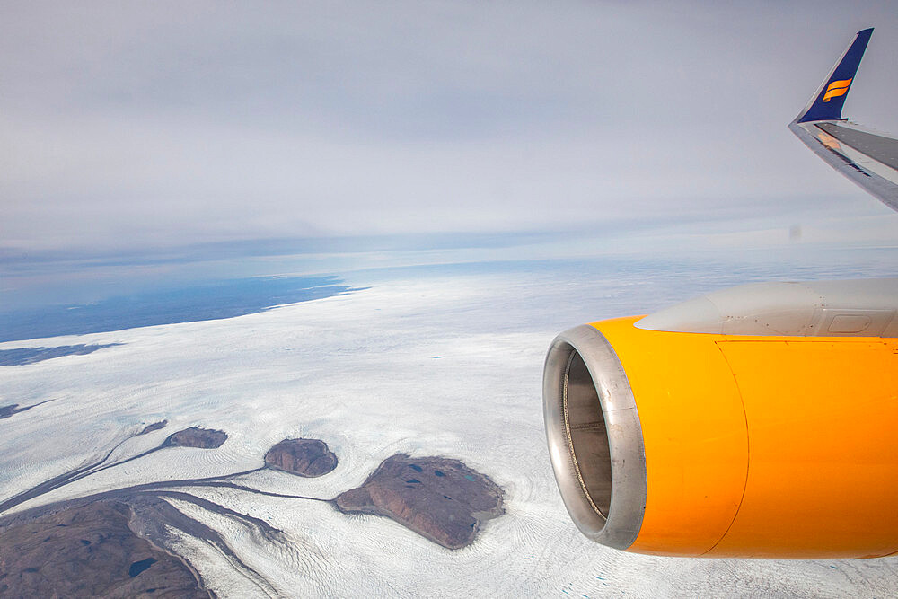 An aerial view of the Greenland ice cap from a commercial flight to Kangerlussuaq, Western Greenland, Denmark, Polar Regions