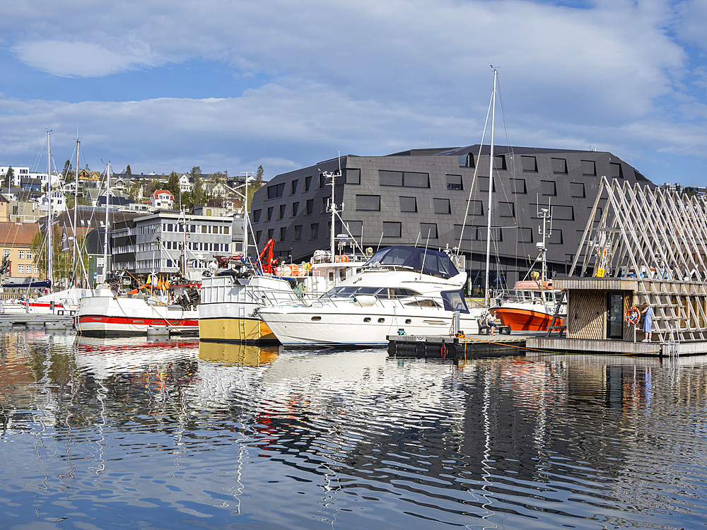 A view of the water front in the city of Tromso, located 217 miles north of the Arctic Circle, Tromso, Norway, Scandinavia, Europe